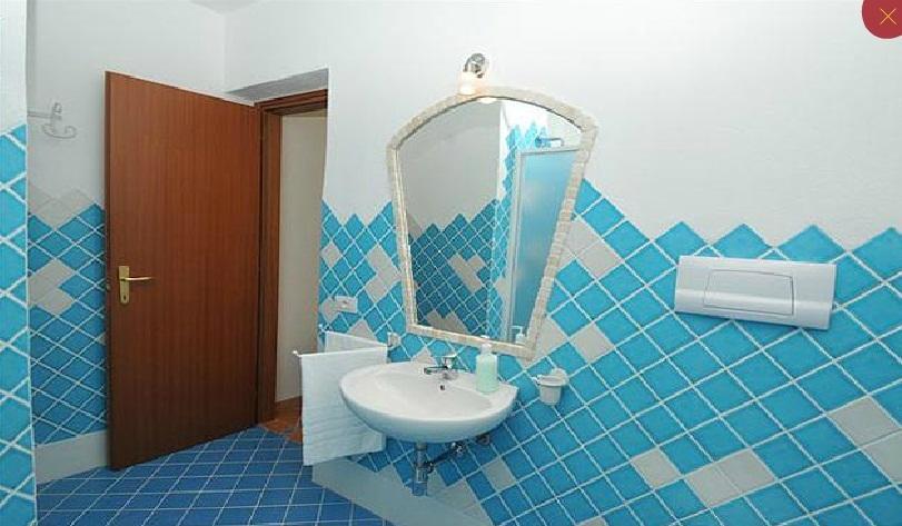 Gallo Spot Hotel San Teodoro  Phòng bức ảnh